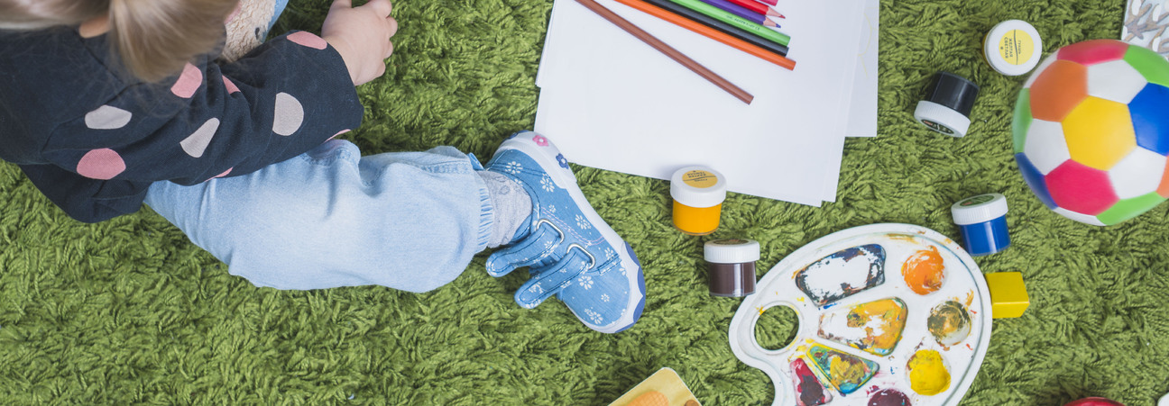 little-girl-sitting-carpet.jpg